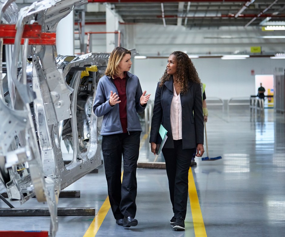 two women along an assembly line