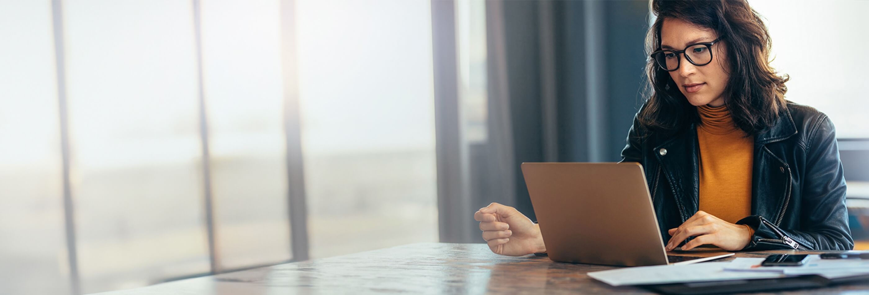 A person watching a laptop